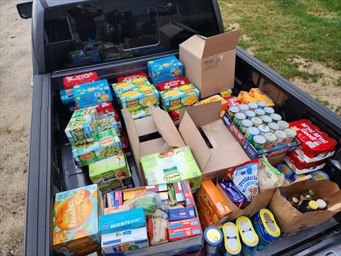 Weed Man Midland and Central Michigan Donate 733 Pounds of Food to Midland’s Open Door